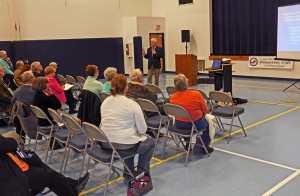 Alan Rasmussen addresses a forum on suicide prevention at the LOW Community Center.